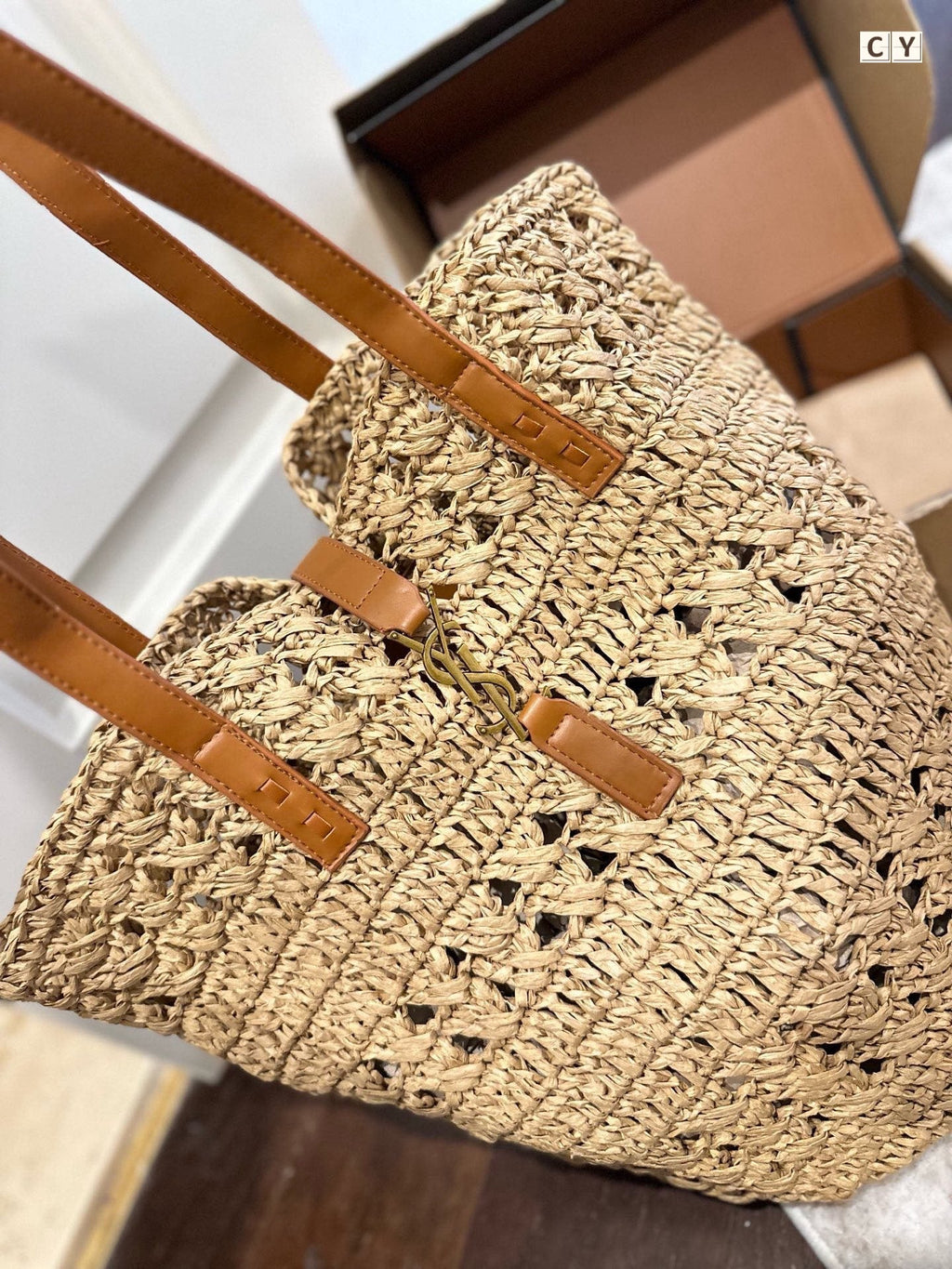 YSL PANIER MEDIUM IN RAFFIA AND VEGETABLE-TANNED LEATHER
